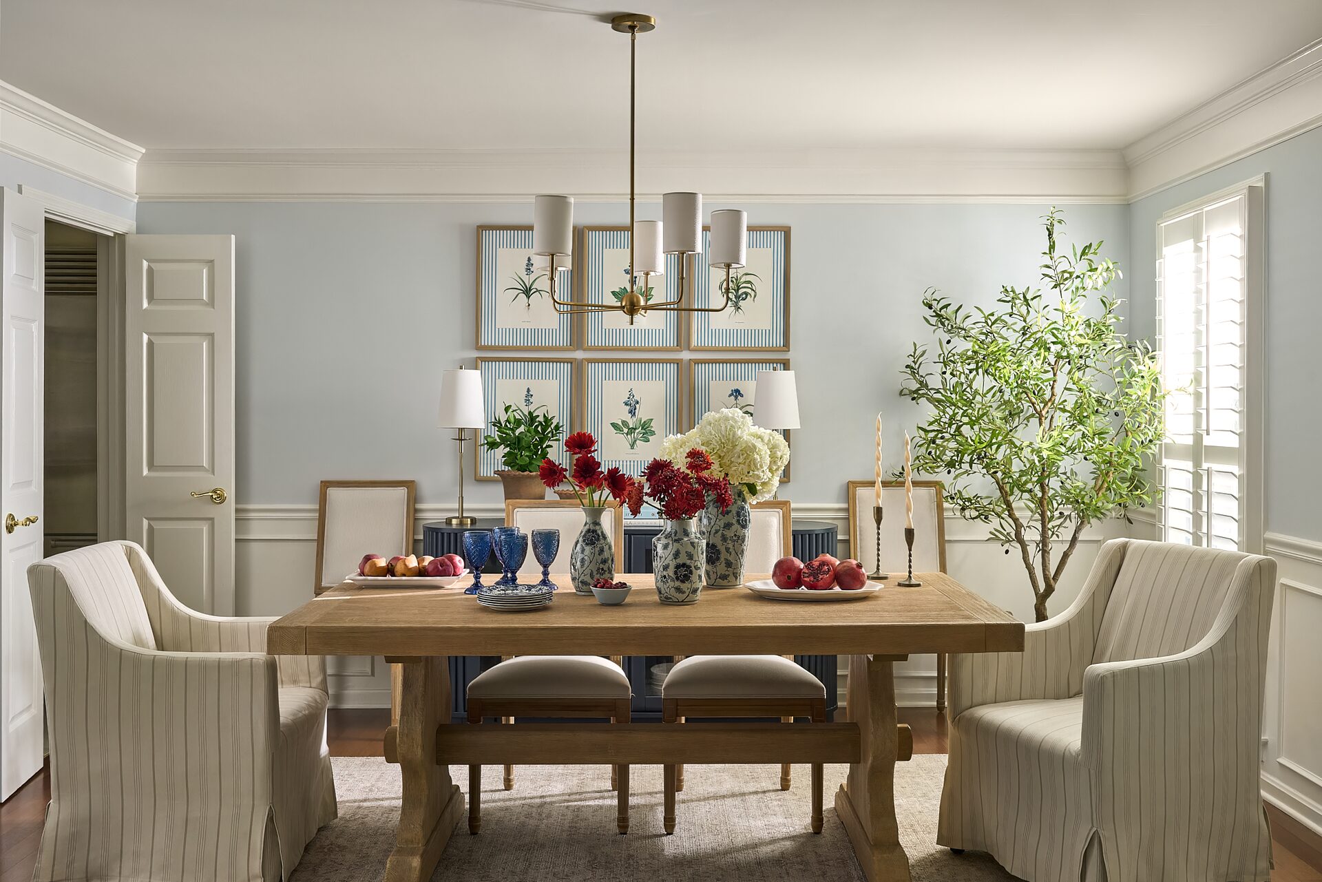 Cranbrook dining room with linen drapery and statement chandelier