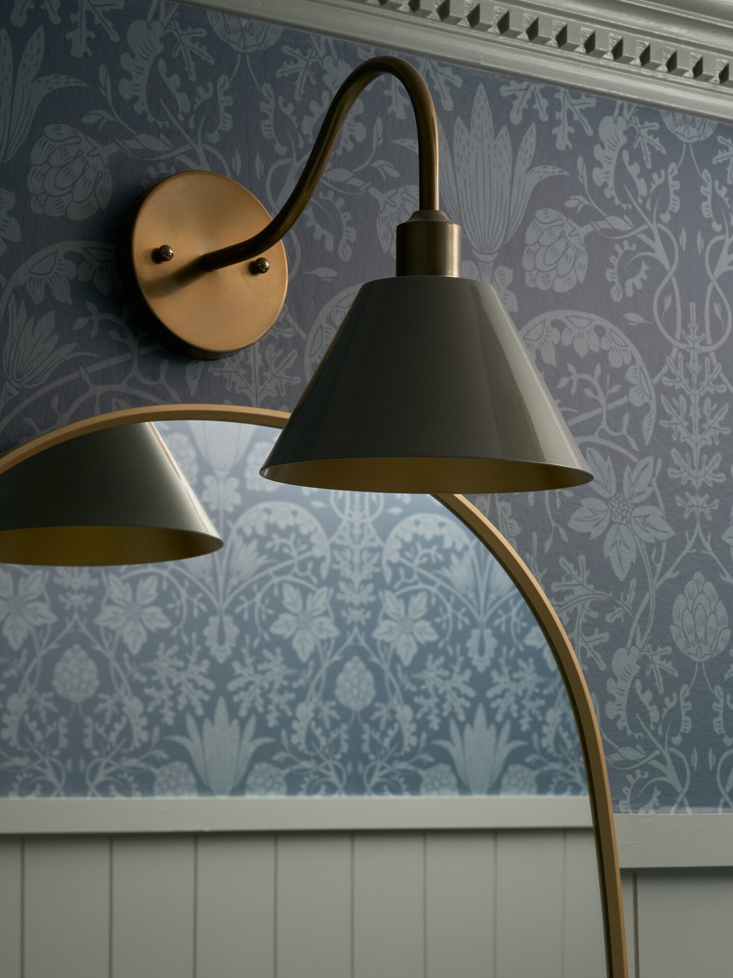 Cranbrook blackened steel sconce with hand-blown glass shade