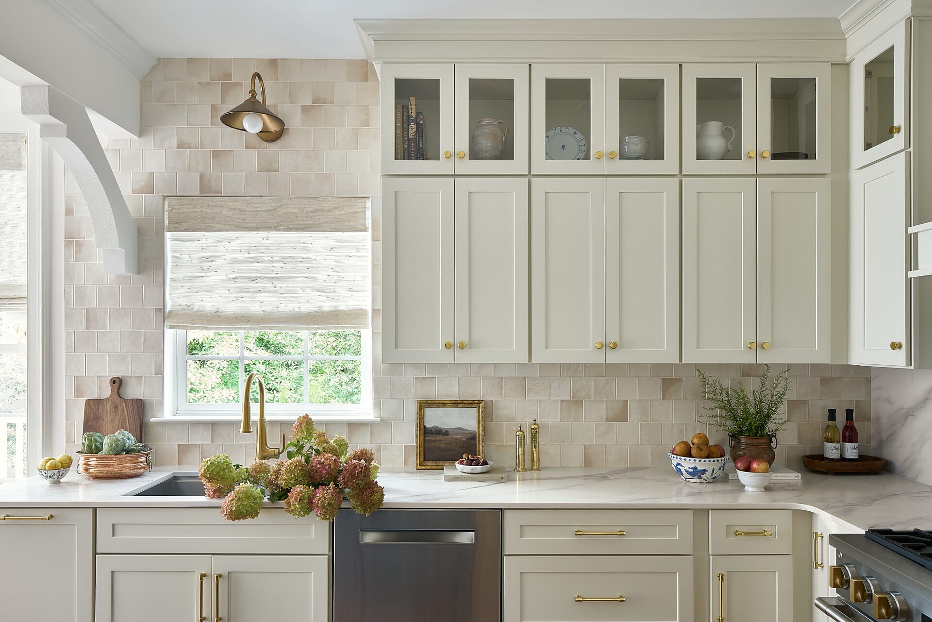 Kensington Kitchen apron-front sink with quartzite countertop and window view
