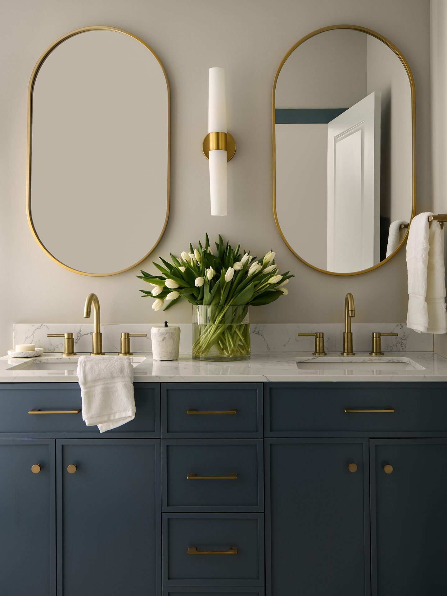 Overview Terrace double vanity with white oak cabinetry and stone countertop